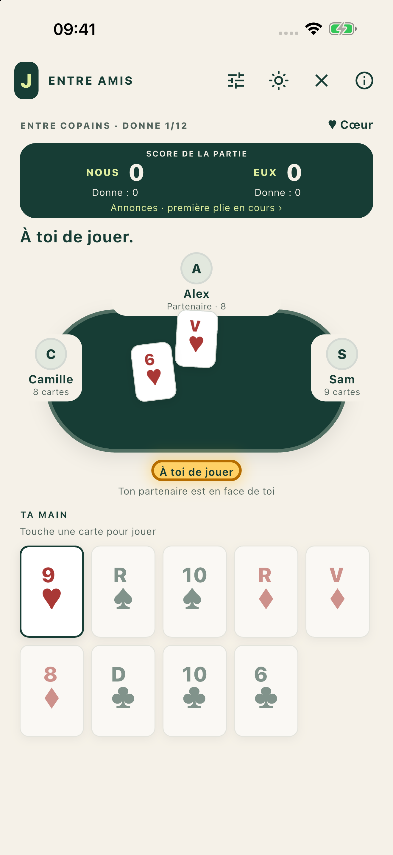 Capture d’une partie de Chibre sur téléphone : cartes en main et tapis de jeu.